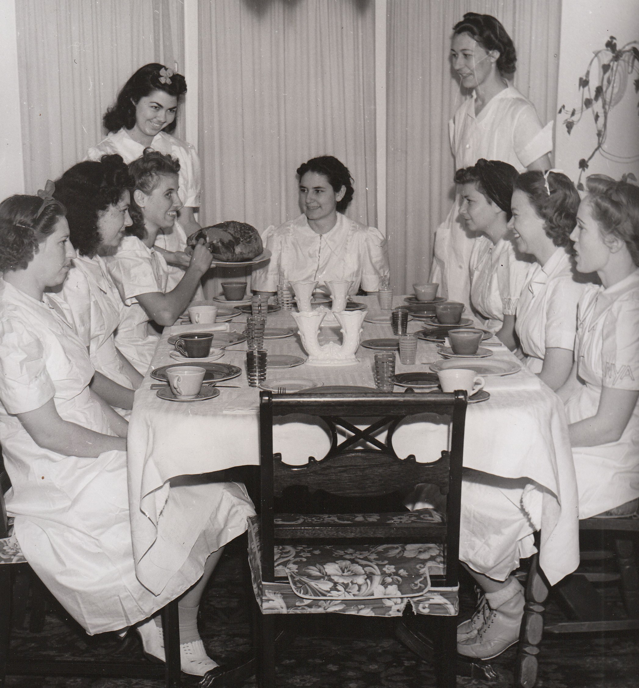 Young women training to be domestic workers in South Gate, California, get ready to enjoy the fruits of their labor. Photo courtesy of the National Archives (ca. 1935-1943).