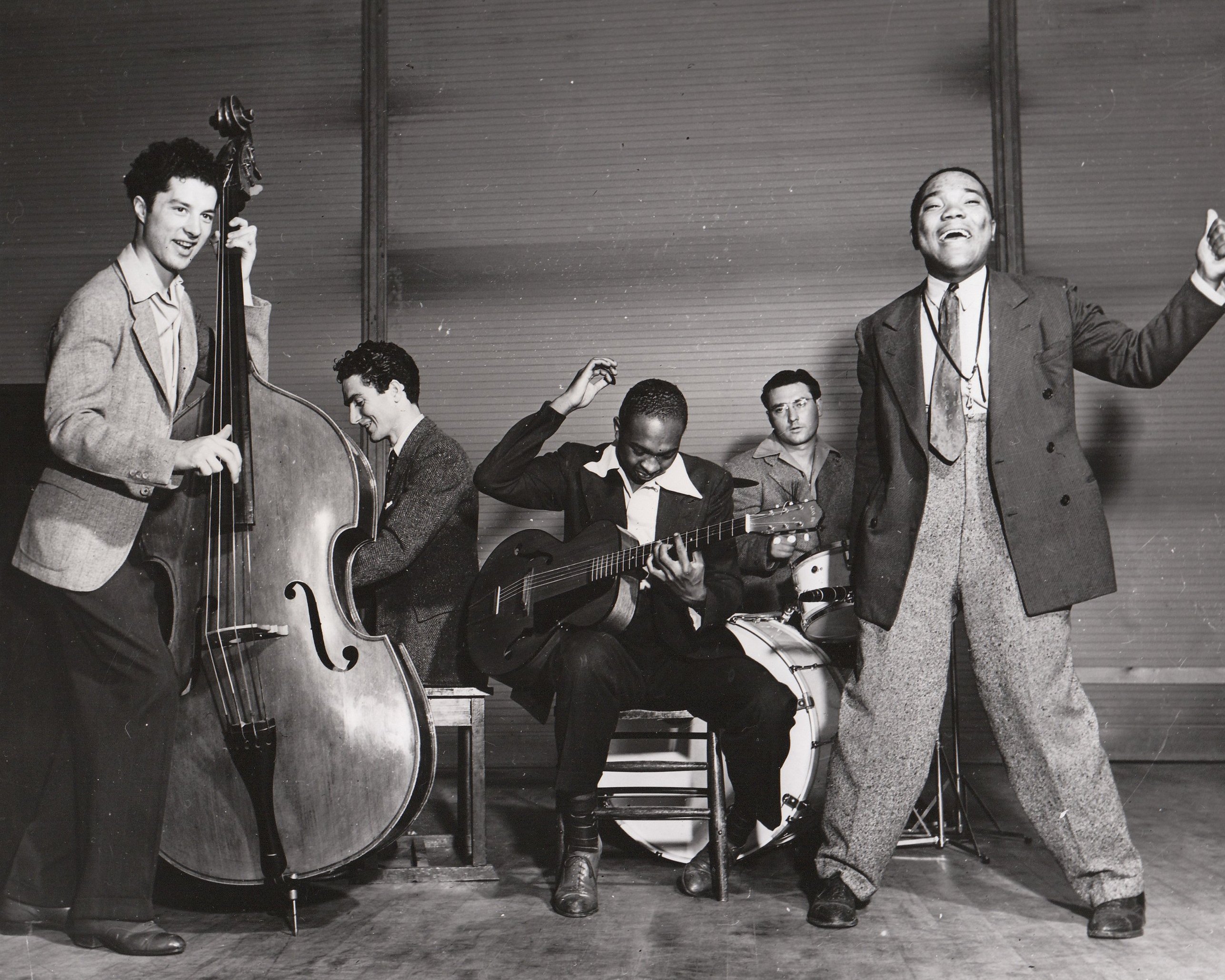 (left to right) Lee Cretarolo, Paul Dunlap, Hall Brant, Jimmy Pulara, and Terry Cruse are glad to make music in an NYA band for their fellow Los Angeles residents. Photo courtesy of the National Archives (ca. 1935-1943).