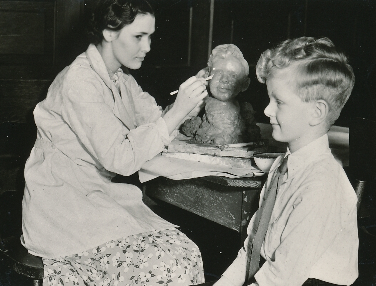 Artist, model, and sculpture all seem content with the WPA’s recreation services in Washington State. Photo courtesy of the National Archives (1937).