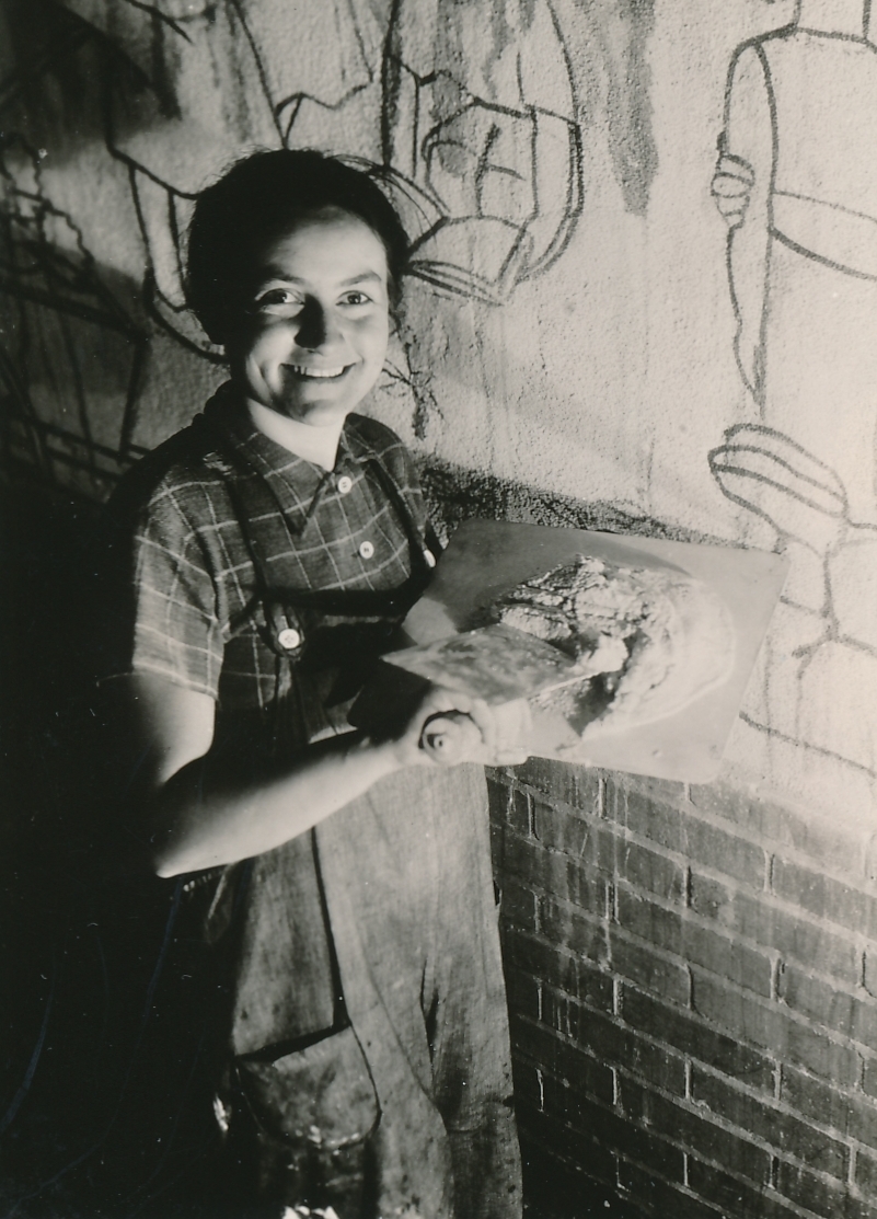WPA artist Lucienne Block is happy to create “Cycle of a Woman’s Life,” a fresco mural at the House of Detention in New York City. Photo courtesy of the National Archives (ca. 1935-1943).