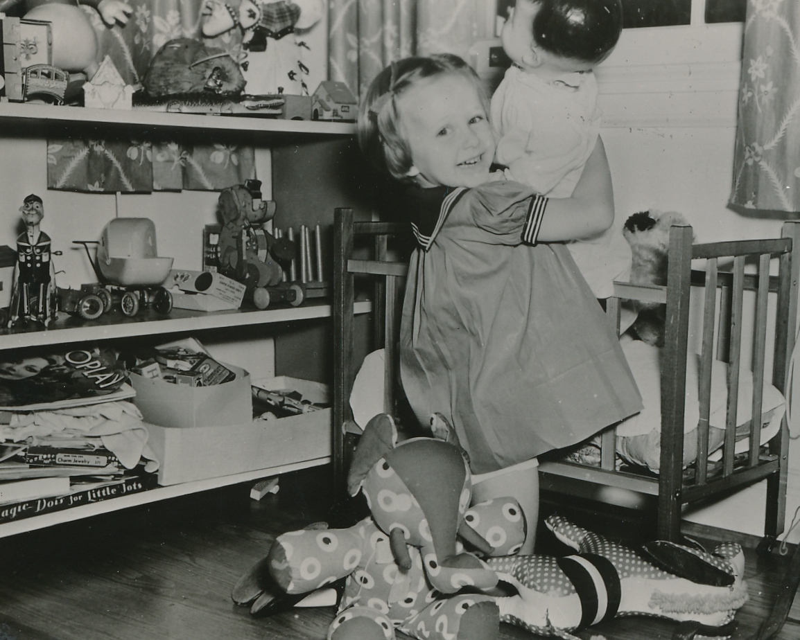Kids and toys just go together, as this young lady shows at a WPA toy repair shop in New Orleans. Photo courtesy of the National Archives (ca. 1935-1943).