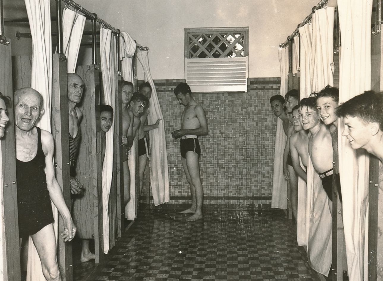New and clean showers, and plenty of them, bring cheer to this WPA-built swimming pool facility in Monroe, Louisiana. Photo courtesy of the National Archives (ca. 1935-1943).