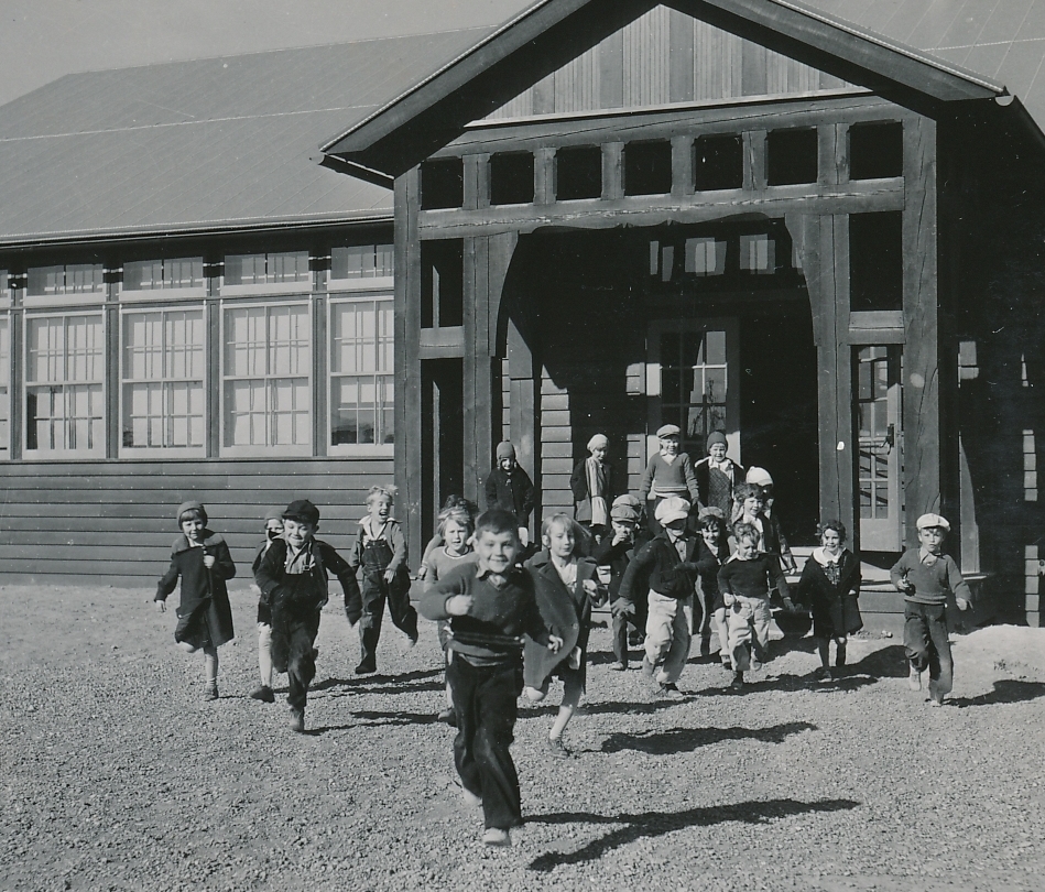 A brand new PWA-funded school in Fort Peck, Montana is nice; and so is the end of the school day! Photo courtesy of the National Archives (ca. 1935-1940).