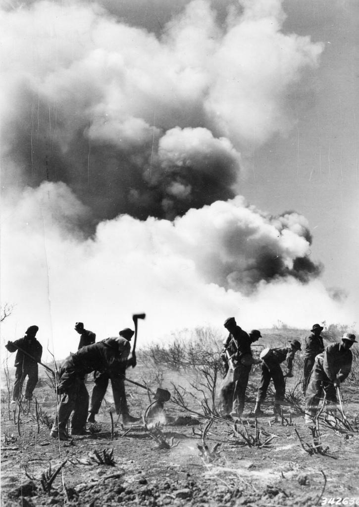 Members of the Civilian Conservation Corps work to control the Malibu fire near Angeles National Forest, California, 1935.